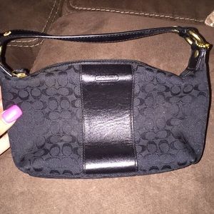 Tiny black coach purse